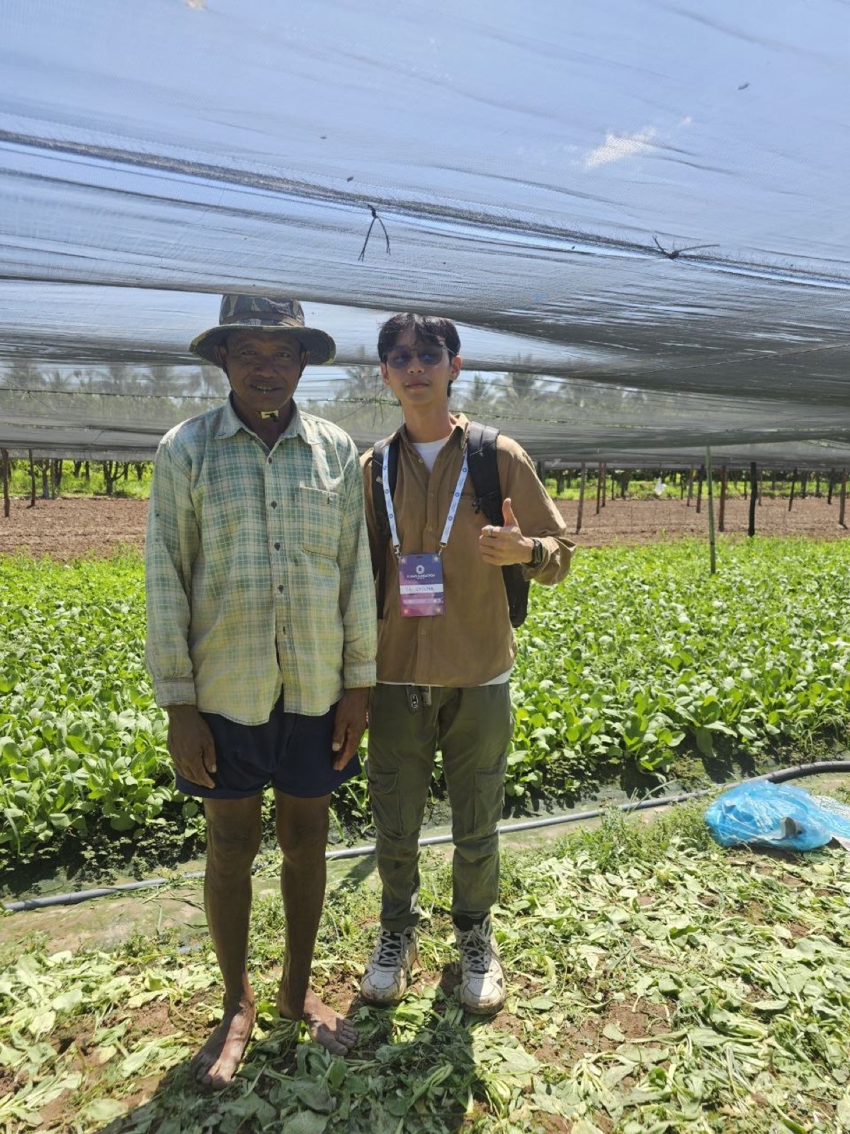 Chomkar team with a bok choy farmer, Tramkak